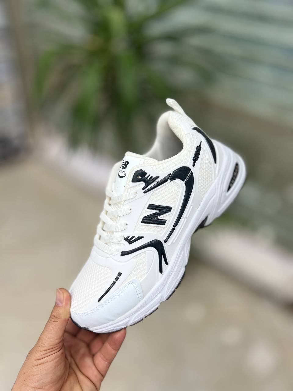 نیوبالانس پختی سفید مشکی ازسایز۳۷تا۴۴ موجوده